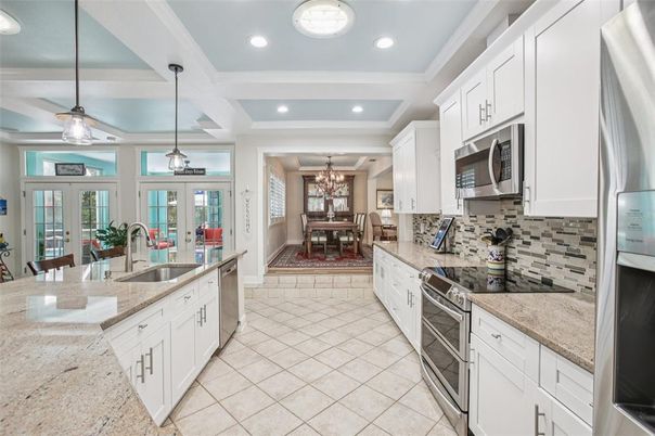 Chandelier, Dining room, Interior, Kitchen, Pendant Lights, Recessed Lighting, Stainless Steel Appliances