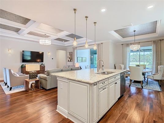 Chandelier, Dining room, Interior, Kitchen, Living room, Pendant Lights, Recessed Lighting, Wood Texture Flooring