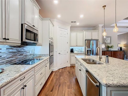Interior, Kitchen, Pendant Lights, Recessed Lighting, Stainless Steel Appliances, Wood Texture Flooring