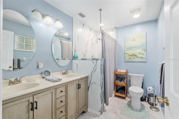 Bathroom, Dual Sink Vanities, Interior, Marble, Marble Walls, Recessed Lighting