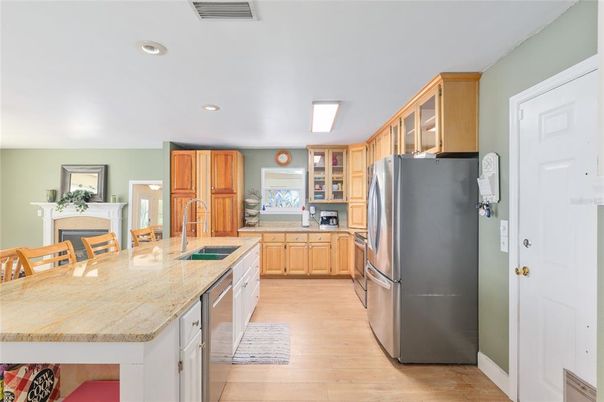 Fireplace, Interior, Kitchen, Recessed Lighting, Wood Texture Flooring