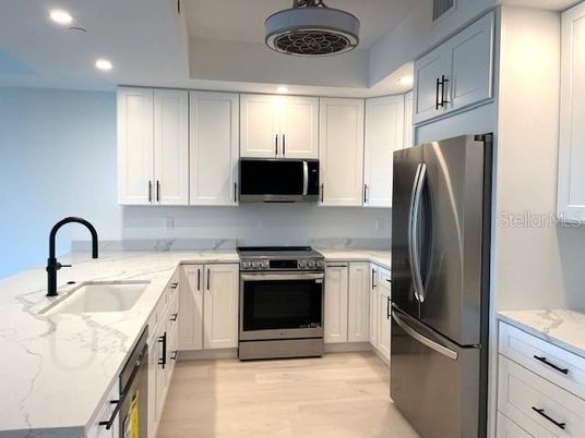 Interior, Kitchen, Recessed Lighting, Stainless Steel Appliances, Wood Texture Flooring