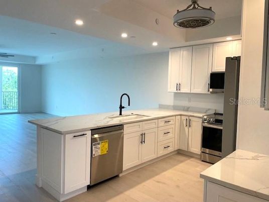Interior, Kitchen, Recessed Lighting, Stainless Steel Appliances, Wood Texture Flooring