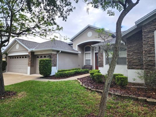 Attached, Backyard, Exterior, Facade, Brick Facade, Mediterranean