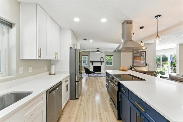 Interior, Kitchen, Pendant Lights, Recessed Lighting, Stainless Steel Appliances, Wood Texture Flooring