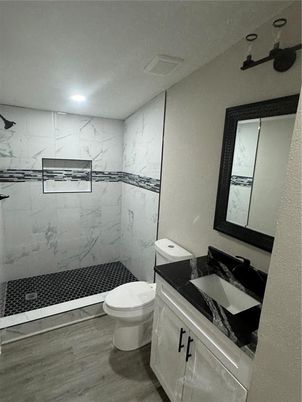 Bathroom, Interior, Marble Walls, Recessed Lighting, Wood Texture Flooring