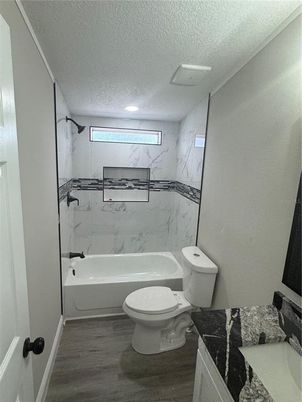 Bathroom, Interior, Marble Walls, Recessed Lighting, Wood Texture Flooring