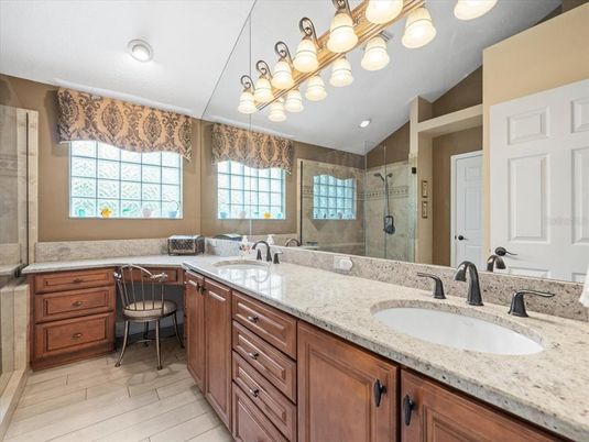 Bathroom, Dual Sink Vanities, Glass Shower, Interior, Recessed Lighting, Wood Texture Flooring