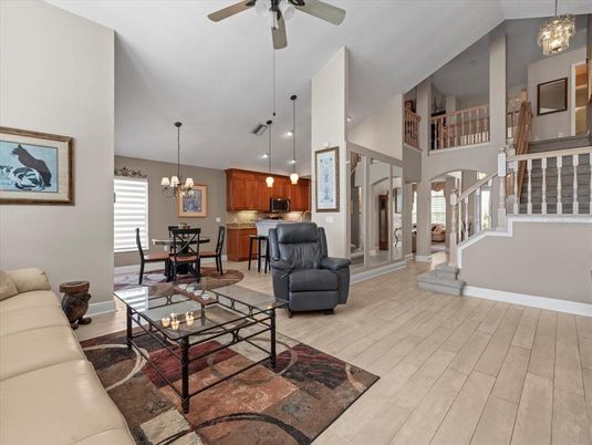 Chandelier, Dining room, Interior, Kitchen, Living room, Pendant Lights, Recessed Lighting, Wood Texture Flooring