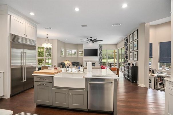 Chandelier, Dining room, Interior, Kitchen, Recessed Lighting, Stainless Steel Appliances, Wood Texture Flooring