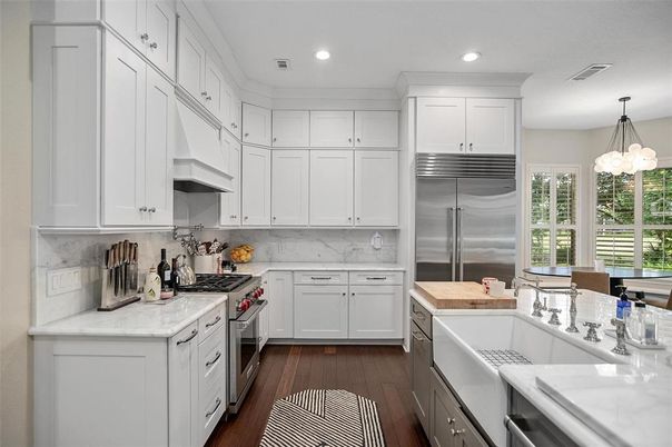 Chandelier, Interior, Kitchen, Pendant Lights, Recessed Lighting, Stainless Steel Appliances, Wood Texture Flooring