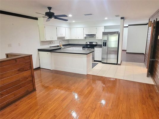 Interior, Kitchen, Recessed Lighting, Stainless Steel Appliances, Wood Texture Flooring