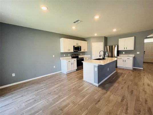 Interior, Kitchen, Recessed Lighting, Stainless Steel Appliances, Wood Texture Flooring