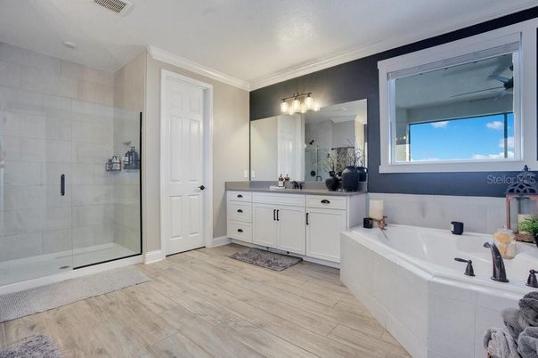 Bathroom, Dual Sink Vanities, Glass Shower, Interior, Wood Texture Flooring