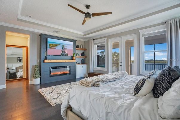 Bedroom, Fireplace, Interior, Water, Wood Texture Flooring