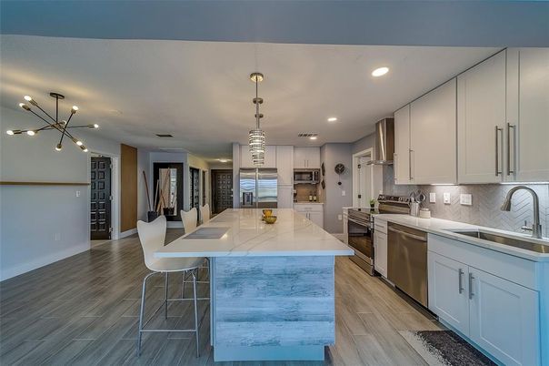 Interior, Kitchen, Pendant Lights, Recessed Lighting, Stainless Steel Appliances, Wood Texture Flooring