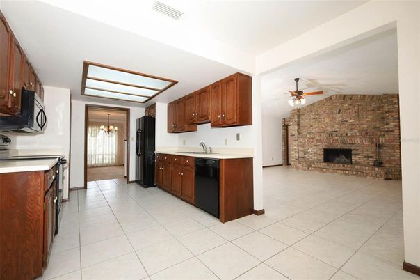 Fireplace, Interior, Kitchen, Pendant Lights, Stone Walls