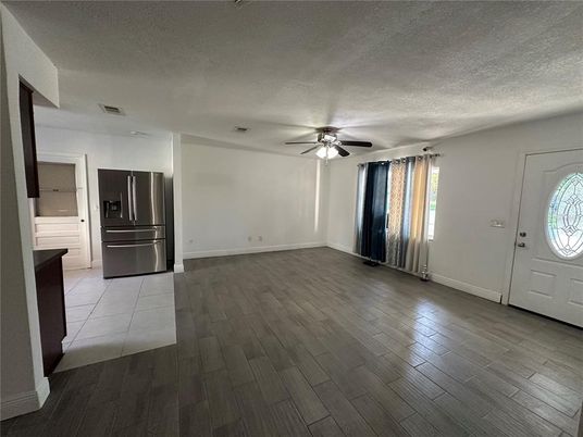 Empty room, Interior, Kitchen, Stainless Steel Appliances, Wood Texture Flooring