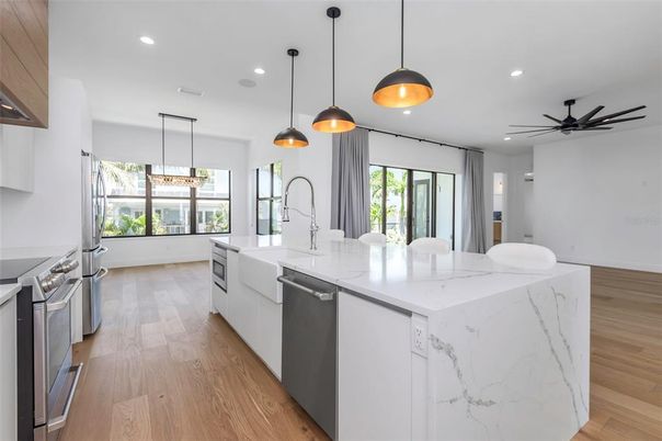 Interior, Kitchen, Pendant Lights, Recessed Lighting, Stainless Steel Appliances, Wood Texture Flooring