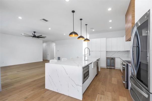 Interior, Kitchen, Pendant Lights, Recessed Lighting, Stainless Steel Appliances, Wood Texture Flooring