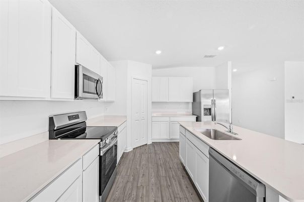 Interior, Kitchen, Recessed Lighting, Stainless Steel Appliances, Wood Texture Flooring