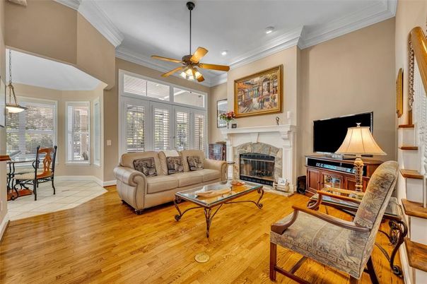 Dining room, Fireplace, Interior, Living room, Pendant Lights, Recessed Lighting, Wood Texture Flooring