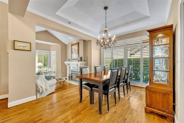 Chandelier, Dining room, Fireplace, Interior, Recessed Lighting, Wood Texture Flooring