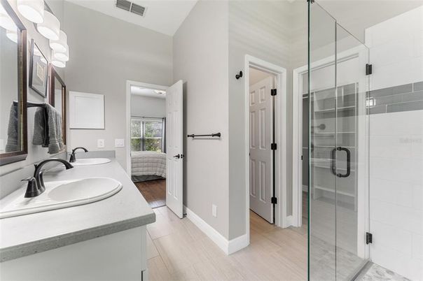 Bathroom, Dual Sink Vanities, Glass Shower, Interior, Wood Texture Flooring