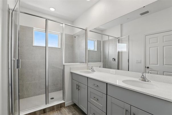 Bathroom, Dual Sink Vanities, Glass Shower, Interior, Recessed Lighting, Wood Texture Flooring