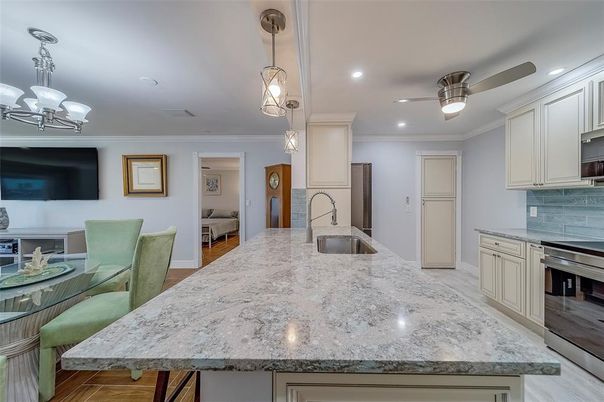 Chandelier, Interior, Kitchen, Pendant Lights, Recessed Lighting, Stainless Steel Appliances, Wood Texture Flooring