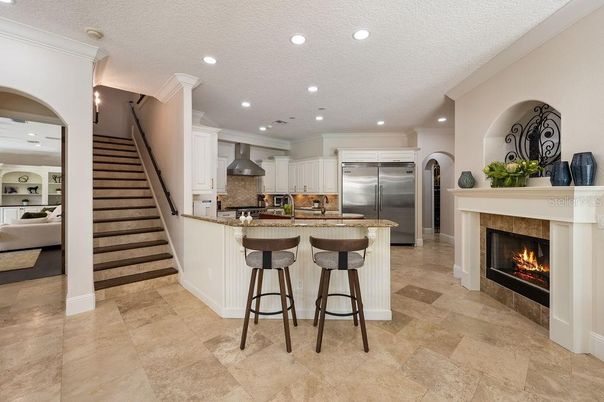 Fireplace, Interior, Kitchen, Recessed Lighting, Stainless Steel Appliances