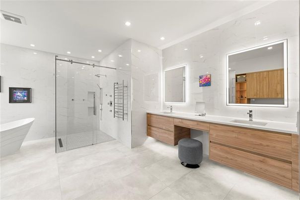 Bathroom, Dual Sink Vanities, Free Standing Baths, Glass Shower, Interior, Marble Walls, Recessed Lighting