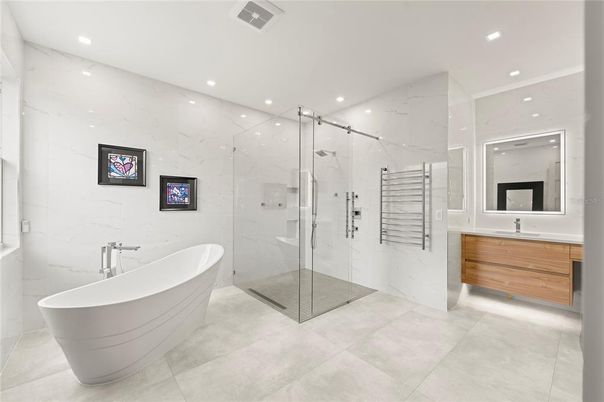 Bathroom, Free Standing Baths, Glass Shower, Interior, Marble Walls, Recessed Lighting