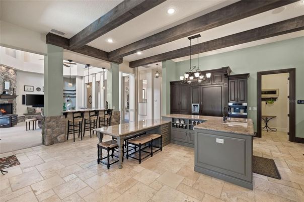 Fireplace, Interior, Kitchen, Pendant Lights, Recessed Lighting, Stainless Steel Appliances, Wooden Beams
