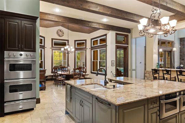 Chandelier, Dining room, Interior, Kitchen, Pendant Lights, Recessed Lighting, Stainless Steel Appliances, Wooden Beams