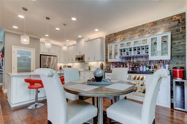 Dining room, Interior, Kitchen, Pendant Lights, Recessed Lighting, Stainless Steel Appliances, Wood Texture Flooring