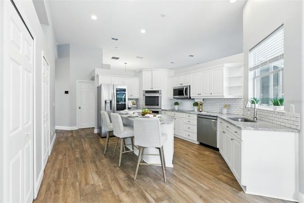 Interior, Kitchen, Pendant Lights, Recessed Lighting, Stainless Steel Appliances, Wood Texture Flooring