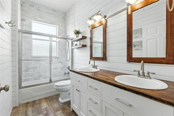 Bathroom, Dual Sink Vanities, Glass Shower, Interior, Wood Texture Flooring