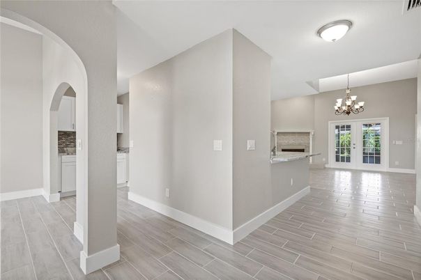Chandelier, Empty room, Fireplace, Interior, Wood Texture Flooring