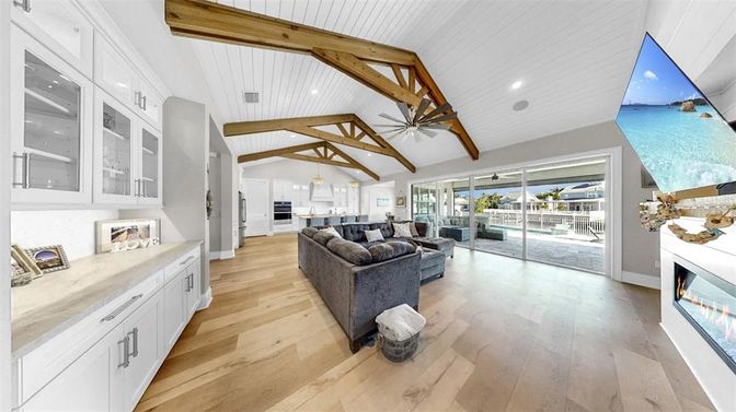 Fireplace, Interior, Living room, Pendant Lights, Recessed Lighting, Wooden Beams, Wood Texture Flooring