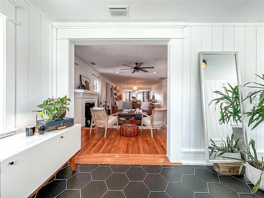 Dining room, Fireplace, Interior, Living room, Recessed Lighting, Wood Texture Flooring