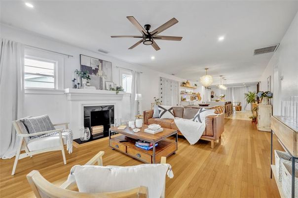 Chandelier, Dining room, Fireplace, Interior, Living room, Recessed Lighting, Wood Texture Flooring