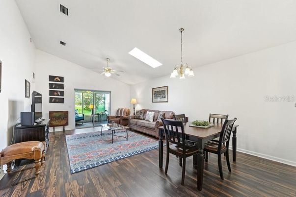 Chandelier, Dining room, Interior, Living room, Pendant Lights, Piano, Wood Texture Flooring