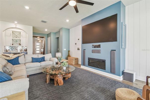 Fireplace, Interior, Living room, Recessed Lighting, Wood Texture Flooring