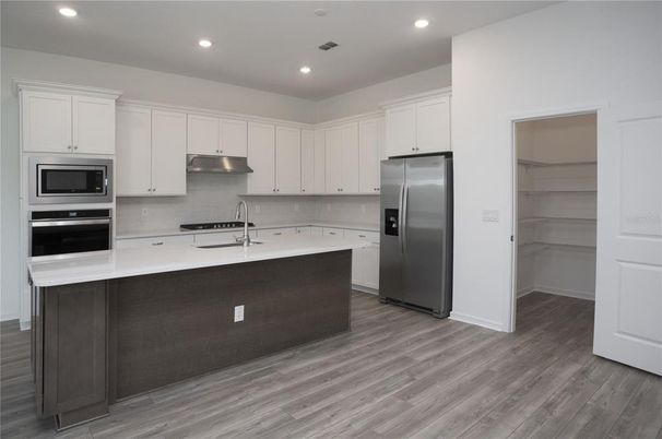 Interior, Kitchen, Recessed Lighting, Stainless Steel Appliances, Wood Texture Flooring