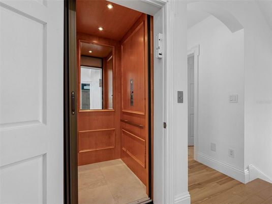 Elevator, Interior, Recessed Lighting, Wooden Ceilings, Wood Texture Flooring, Wooden Walls