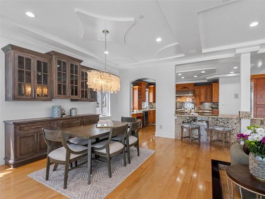 Chandelier, Dining room, Interior, Kitchen, Recessed Lighting, Stainless Steel Appliances, Wood Texture Flooring