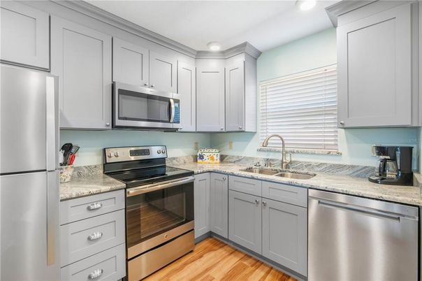 Interior, Kitchen, Recessed Lighting, Stainless Steel Appliances, Wood Texture Flooring