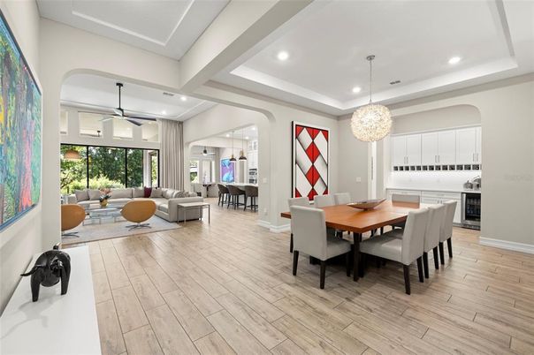Chandelier, Dining room, Interior, Kitchen, Living room, Pendant Lights, Recessed Lighting, Wood Texture Flooring