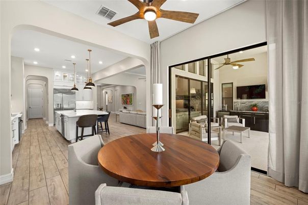 Dining room, Interior, Kitchen, Living room, Pendant Lights, Recessed Lighting, Stainless Steel Appliances, Wood Texture Flooring